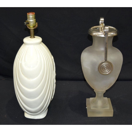 2660 - A Stylish porcelain light base with a female figure in relief together with another heavy opaque gla... 