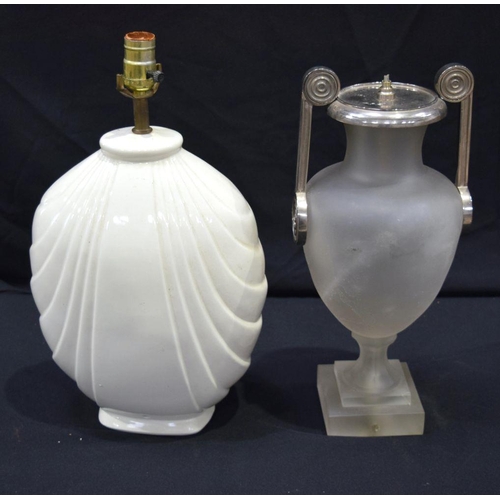 2660 - A Stylish porcelain light base with a female figure in relief together with another heavy opaque gla... 