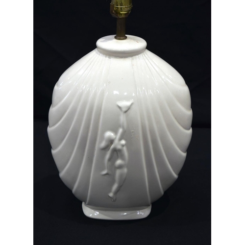 2660 - A Stylish porcelain light base with a female figure in relief together with another heavy opaque gla... 