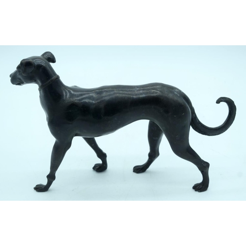 2666 - A Bronze dog 33 x 20cm.