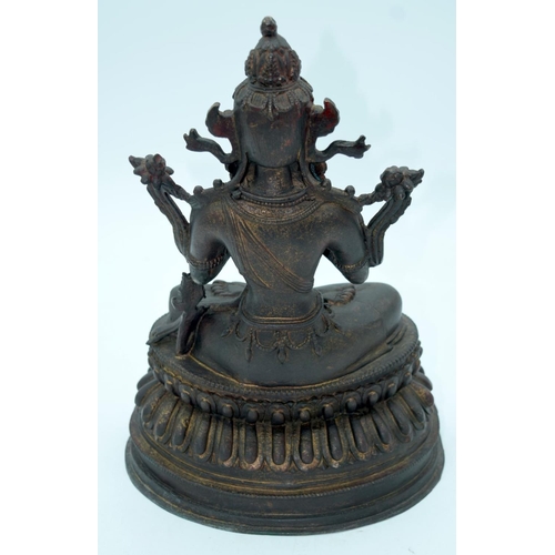 2667 - A large Chinese/Tibetan bronze buddha 35 x 25cm.