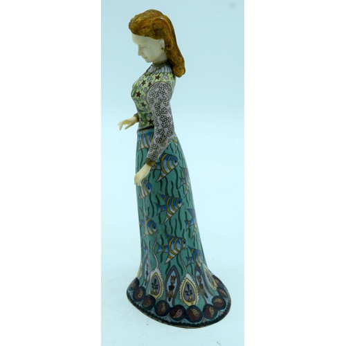 2672 - An unusual enamelled metal figure of a European figure of a female 32cm