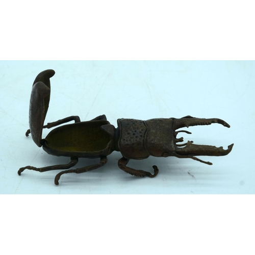 2682 - A Japanese bronze figure of a stag beetle 14 cm.