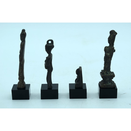 2688 - A Collection of Chinese Tibetan bronze figures on stands. 10cm.