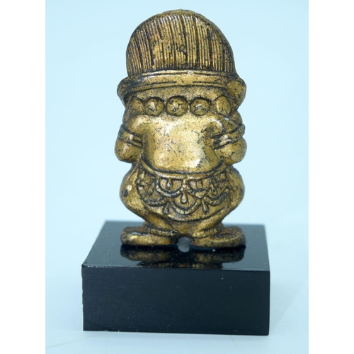 2691 - A small Chinese Tibetan gilt bronze Buddha mounted on a base. 6cm.