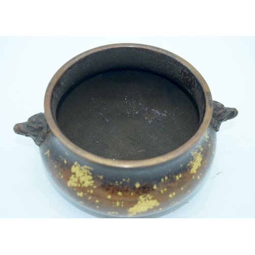 2693 - A Chinese bronze spray censer with beast head handles 19 x 8.5cm.