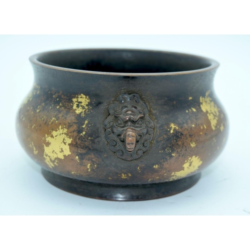 2693 - A Chinese bronze spray censer with beast head handles 19 x 8.5cm.