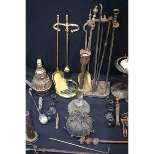 2704 - collection of metal items , hose ends, lamp stands, fire irons/dogs, sword  etc .(Qty)