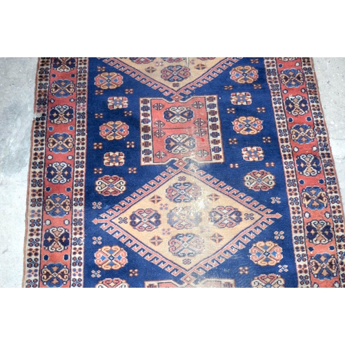 2713 - A Caucasian Shirvan rug 207 x 122cm.