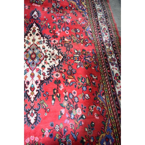 2715 - A large Persian thick pile rug 386 x 260cm.