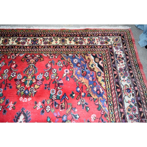 2715 - A large Persian thick pile rug 386 x 260cm.