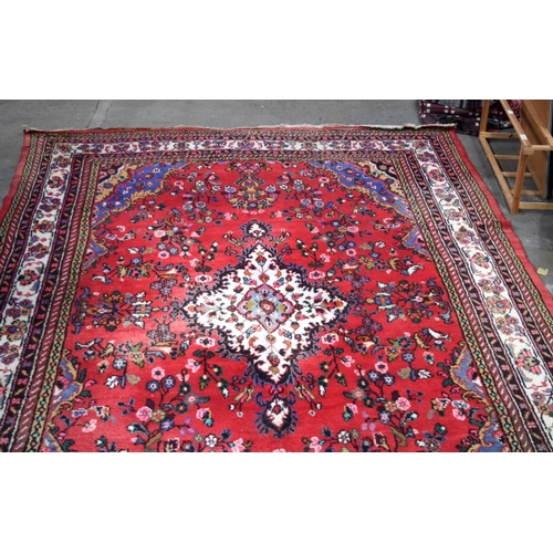 2715 - A large Persian thick pile rug 386 x 260cm.