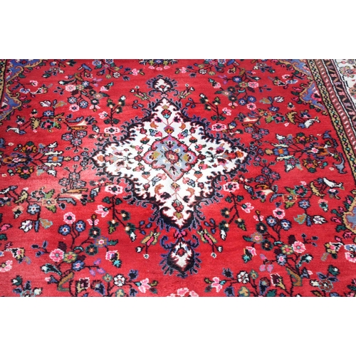 2715 - A large Persian thick pile rug 386 x 260cm.