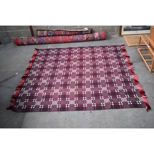 2717 - A large double sided Welsh blanket 230 x 220cm.