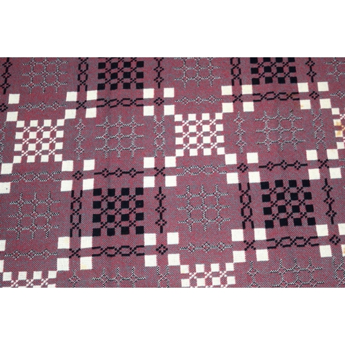 2717 - A large double sided Welsh blanket 230 x 220cm.