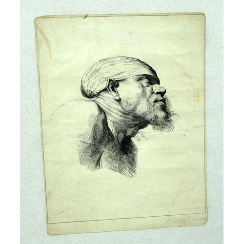 2727 - A framed Lithograph of a street scene and another unframed print of an Arab man 27 x20cm (2)