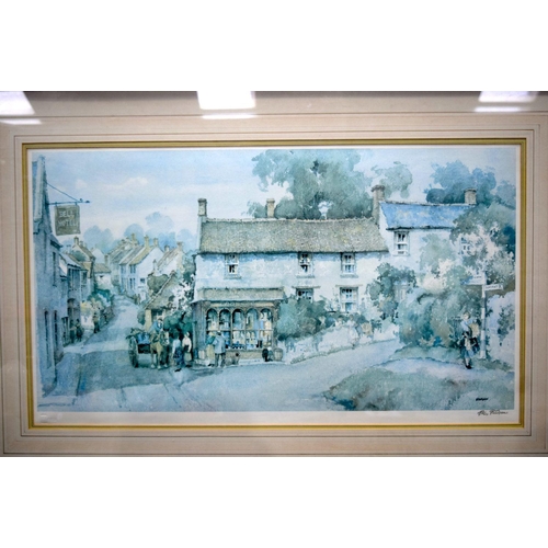 2738 - A large framed print by Sturgeon of a village scene 45 x 79cm.