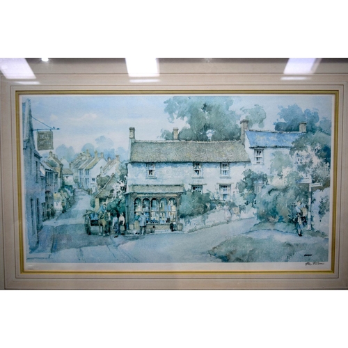 2738 - A large framed print by Sturgeon of a village scene 45 x 79cm.