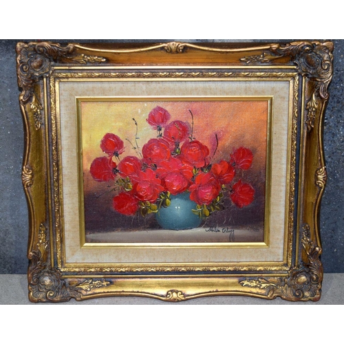 2743 - A framed oil of flowers by Hilda Clegg together with five others (6).