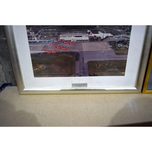 2748 - A framed and signed photograph of the Red  Arrows together with aircraft related pictures/photograph... 