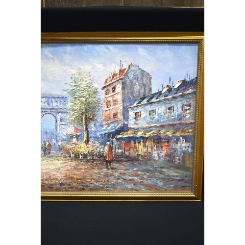 2749 - A large framed oil on canvas by Burnett of a town square. 60 x 120cm.