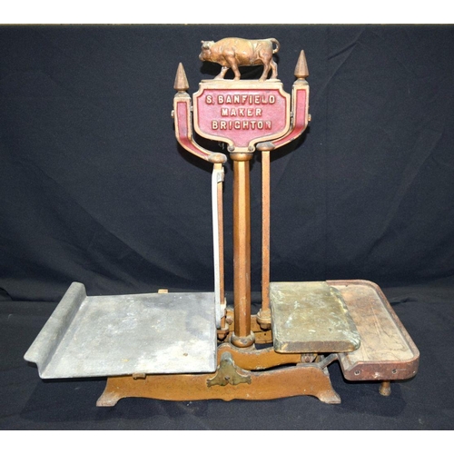 2753 - A cast iron counter top butchers weighing scales by S Barnfield of Brighton 73cm .