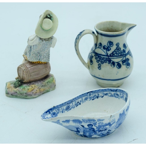 2756 - An early 19th C porcelain invalid feeding bowl, a sparrow beak jug and a figure 12cm (3).