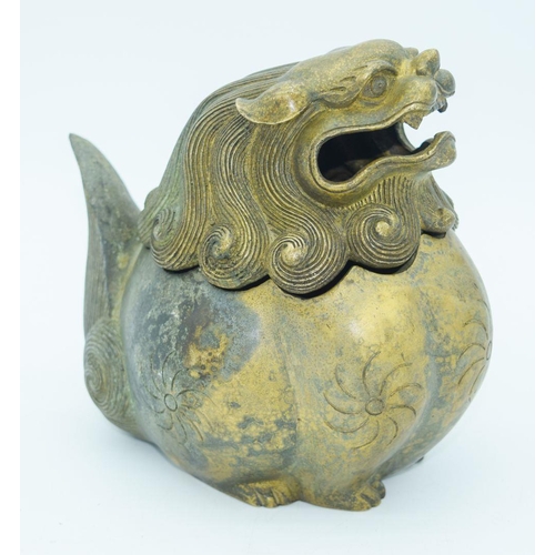 2758 - A Chinese bronze lidded censer in the form of a beast 17 x 17cm (2).