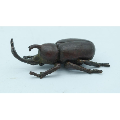 2763 - A Japanese bronze figure of a beetle 6 cm.