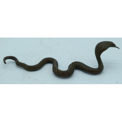 2764 - A Japanese bronze figure of a Cobra 14cm.