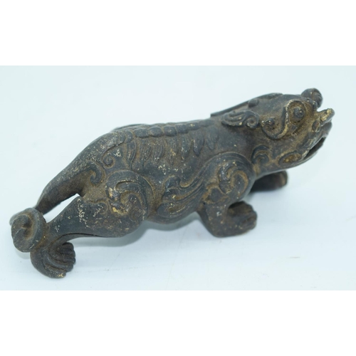 2767 - A Chinese bronze beast 12 x 5cm.