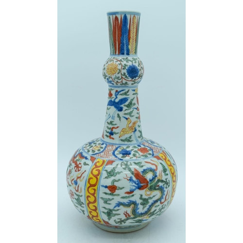 2784 - A Chinese Wucai vase decorated with dragons and birds 38cm .