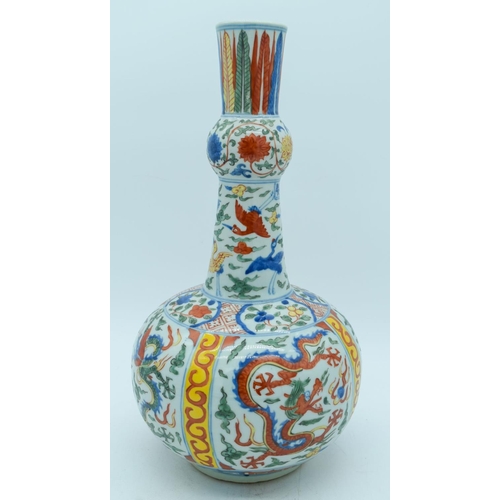 2784 - A Chinese Wucai vase decorated with dragons and birds 38cm .