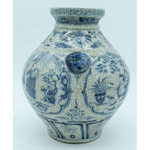 2785 - A Chinese Crackle glaze vase with lions head handles decorated with figures and foliage 27cm