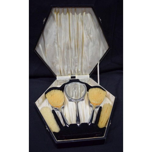 2793 - A lovely silver plate enamelled cased dressing table set largest 26cm.