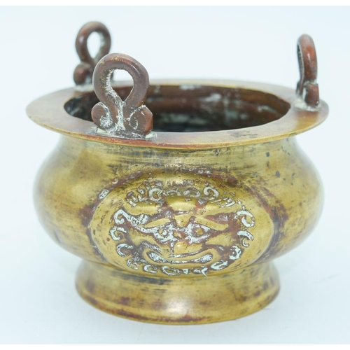 2794 - A Chinese Bronze hanging censer with beast head handles 11.5 x 7cm.