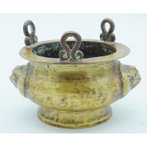 2794 - A Chinese Bronze hanging censer with beast head handles 11.5 x 7cm.