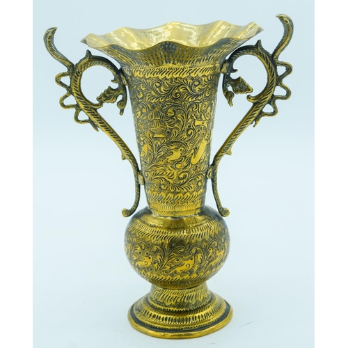 2796 - Indian heavily embossed brass vase with snake handles 23cm.