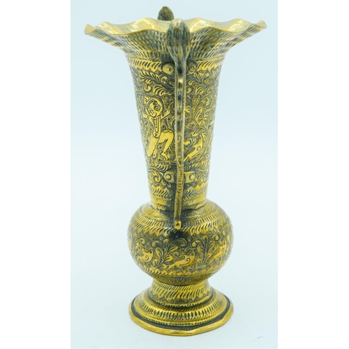 2796 - Indian heavily embossed brass vase with snake handles 23cm.