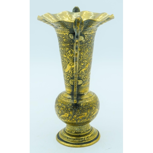 2796 - Indian heavily embossed brass vase with snake handles 23cm.