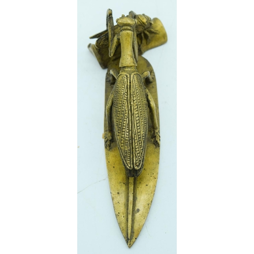 2819 - A small bronze of a locust consuming a beetle 19cm .