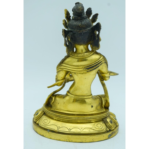 2821 - A Chinese Tibetan gilded bronze buddha 21cm