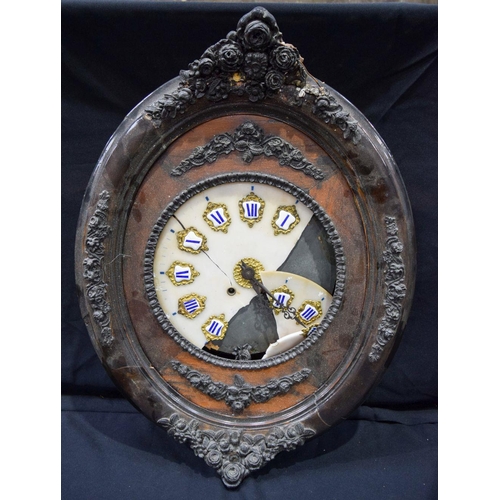 2831 - A large carved wooden surround clock and a  cartel clock 77cm (2).