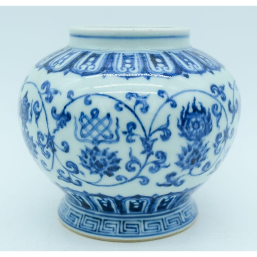 2838 - A Chinese blue  and white vase decorated with Lotus 12cm.