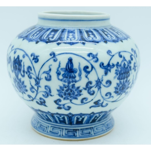 2838 - A Chinese blue  and white vase decorated with Lotus 12cm.