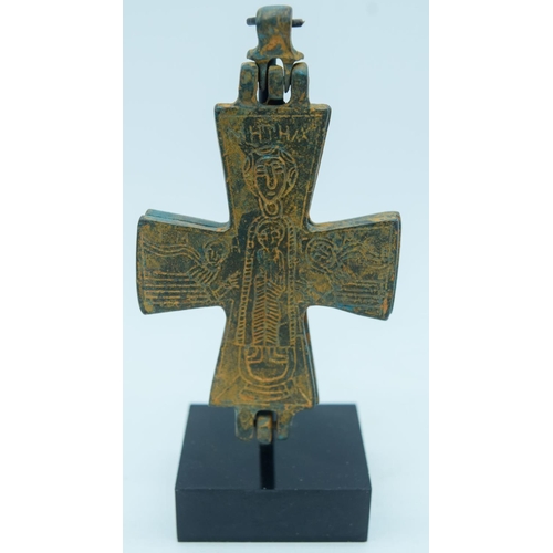 2839 - A Byzantine bronze cross on a stand 11cm.