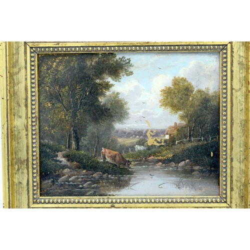 2850 - A framed 19th century Continental school Oil on board depicting a rural scene with cows grazing at a... 