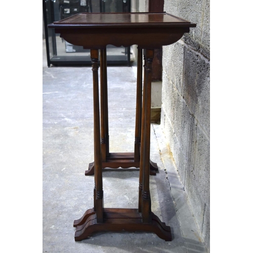 2865 - A nest of mahogany inlaid tables 56 x 38 x 71cm (3).