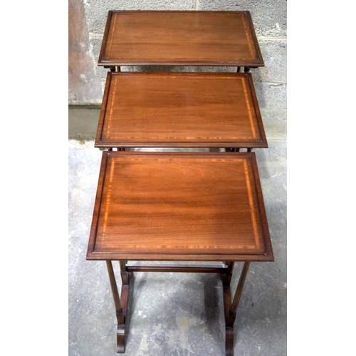 2865 - A nest of mahogany inlaid tables 56 x 38 x 71cm (3).