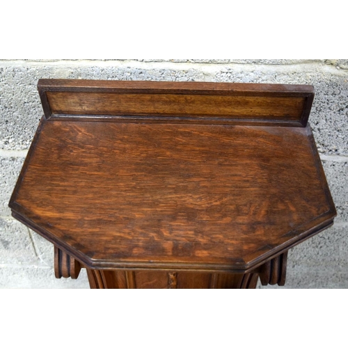 2867 - A small  oak one drawer lectern 45 x 29 x  85cm .